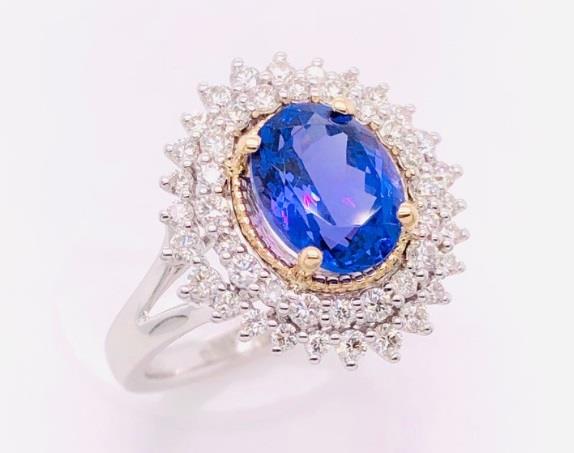 14 Karat White & Yellow Gold Double Halo Ring With One 2.24Ct Oval Tanzanite And 0.59Tw Round Diamonds
Ring Size: 7